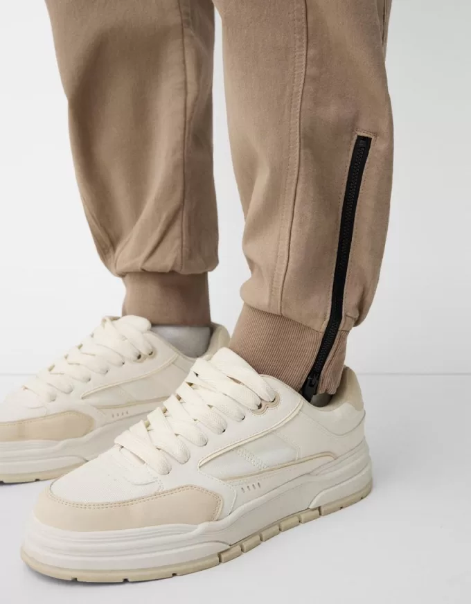 Joggers con cerniere