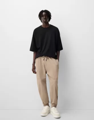 Joggers con cerniere