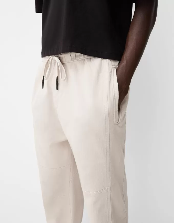 Joggers con cerniere