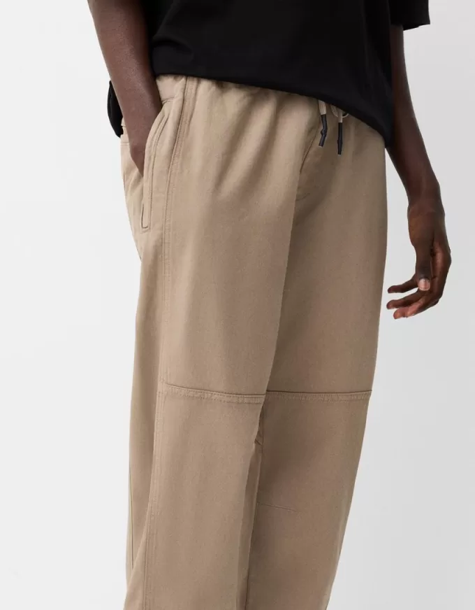 Joggers con cerniere