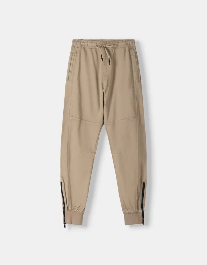 Joggers con cerniere