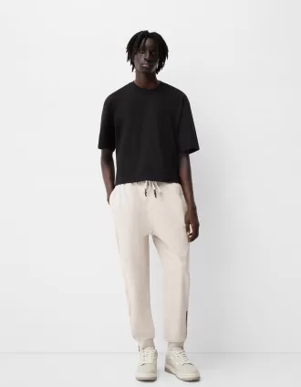 Joggers con cerniere