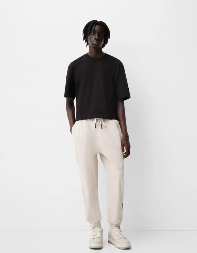 Joggers con cerniere