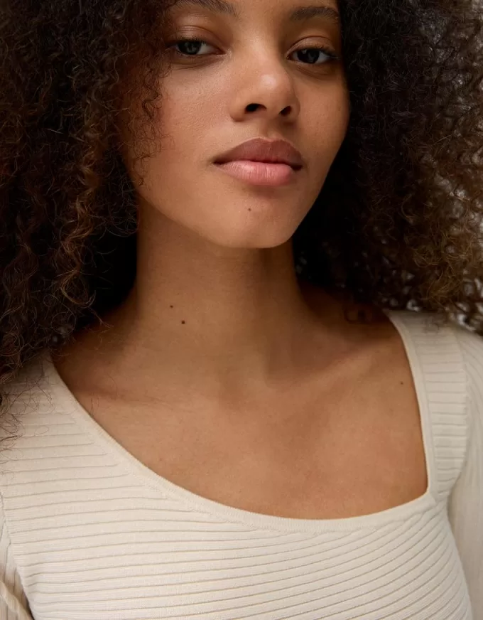 Maglia a costine asimmetrica