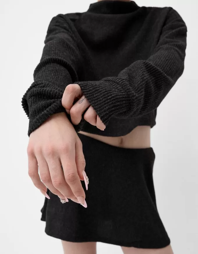 Maglione a collo alto a costine soft touch