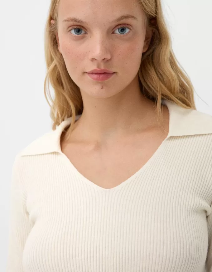 Maglione aderente con colletto polo