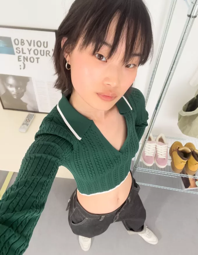 Maglione con collo polo lavorato a trecce