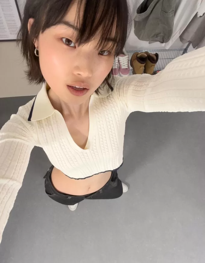 Maglione con collo polo lavorato a trecce