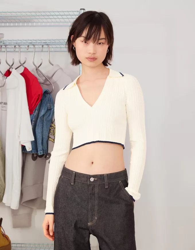 Maglione con collo polo lavorato a trecce