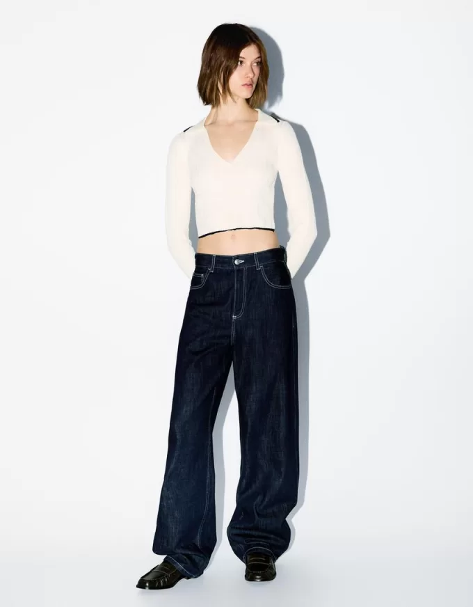 Maglione con collo polo lavorato a trecce