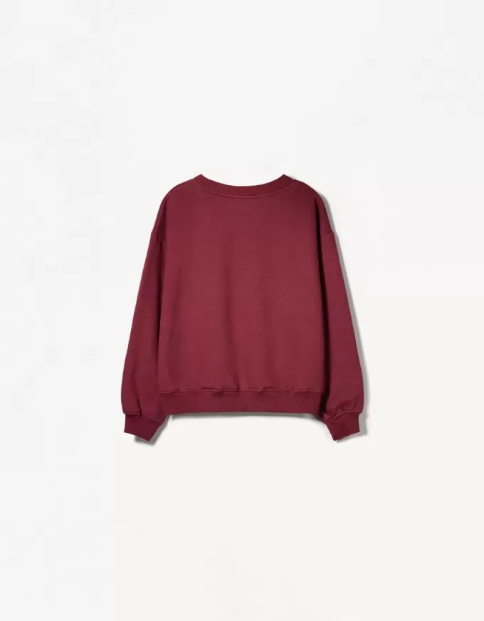 Maglione con scollo a V