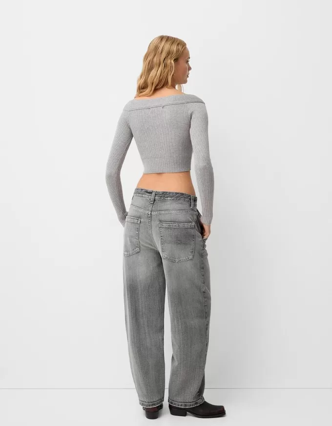 Maglione con scollo a V e spalle scoperte