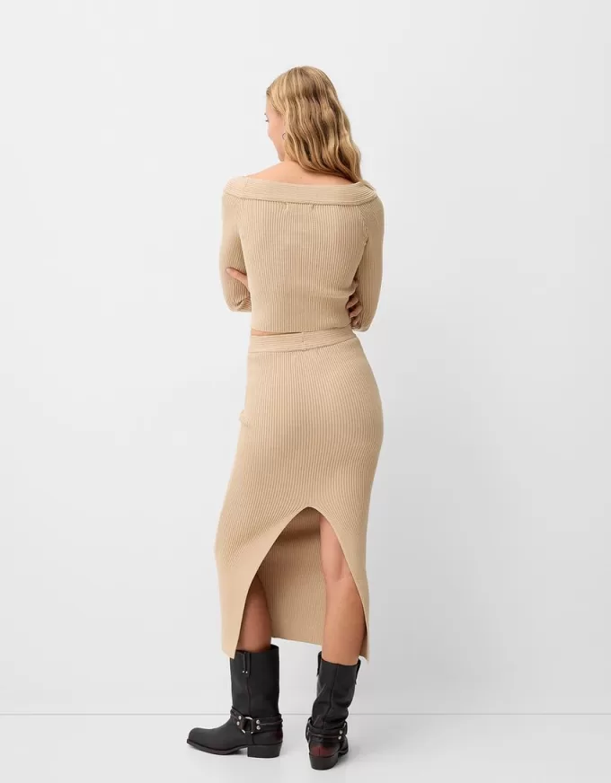 Maglione con scollo a V e spalle scoperte