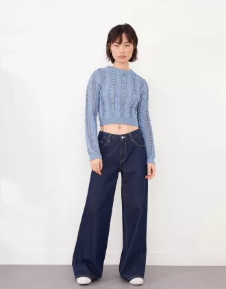 Maglione lavorato a trecce