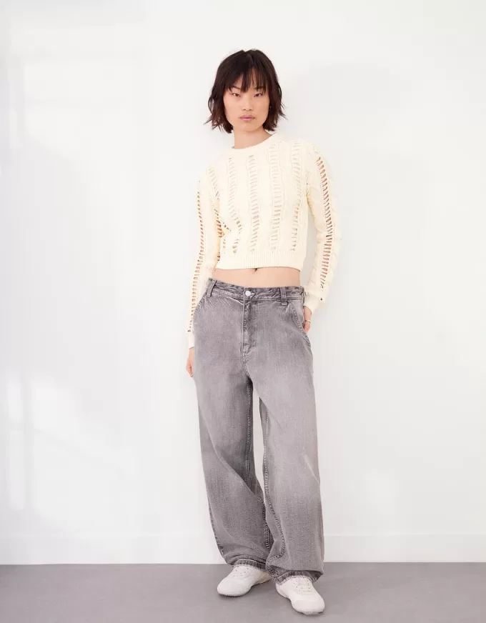 Maglione lavorato a trecce