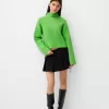 Maglione oversize cropped a costine a collo alto
