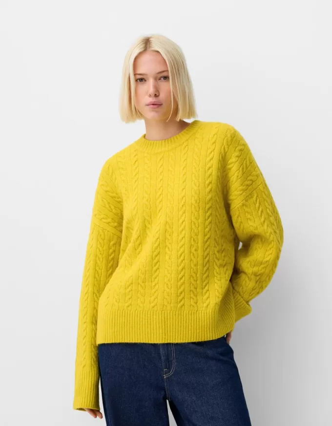Maglione oversize lavorato a trecce
