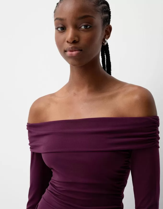 Mini abito a maniche lunghe con volant SERIE BERSHKA