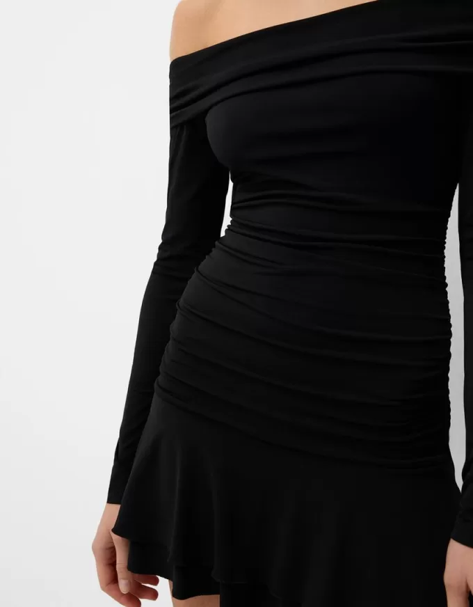 Mini abito a maniche lunghe con volant SERIE BERSHKA