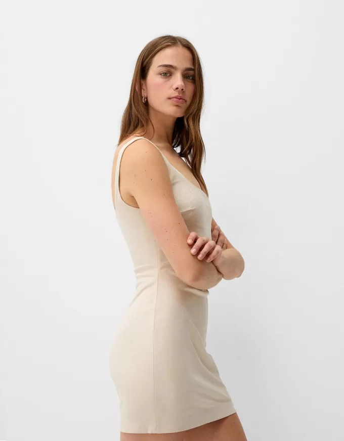 Miniabito aderente effetto pelle