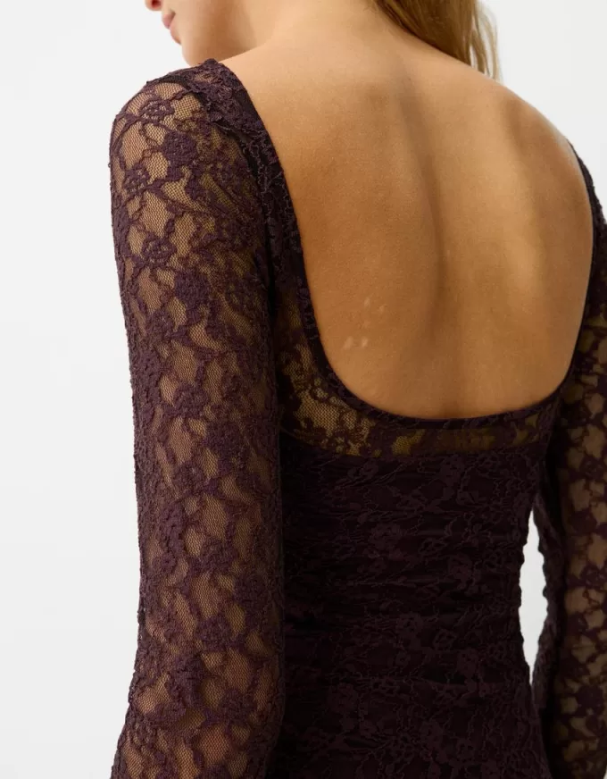 Miniabito biondo a maniche lunghe in pizzo