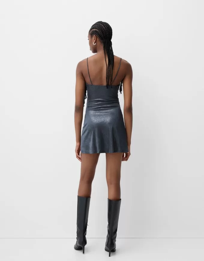 Miniabito con spalline lucide