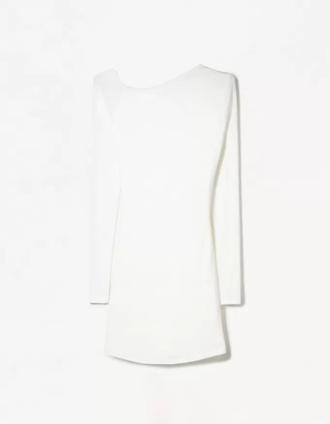 Miniabito morbido al tatto con scollo asimmetrico