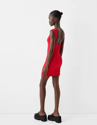 Miniabito testurizzato con schiena scoperta