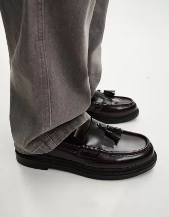 Mocassini con frange e nappine