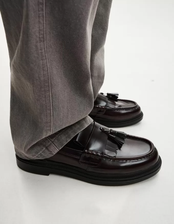 Mocassini con frange e nappine