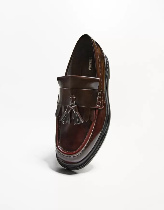 Mocassini con frange e nappine