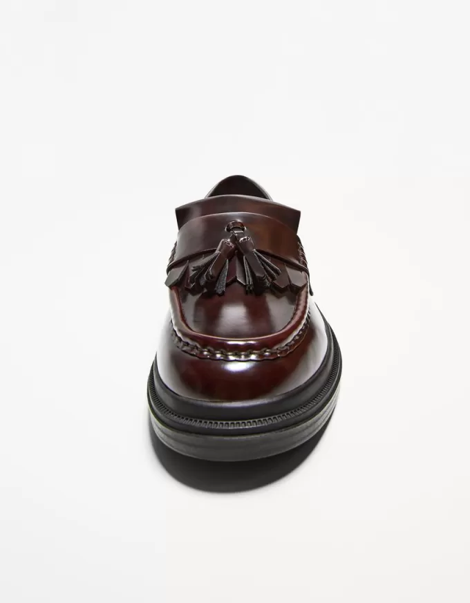 Mocassini con frange e nappine