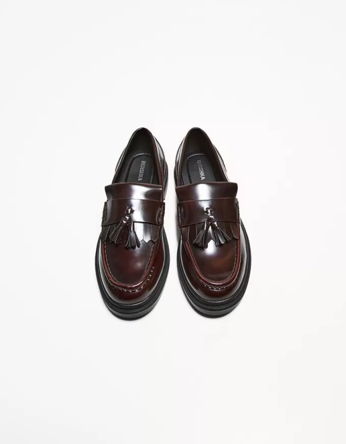 Mocassini con frange e nappine