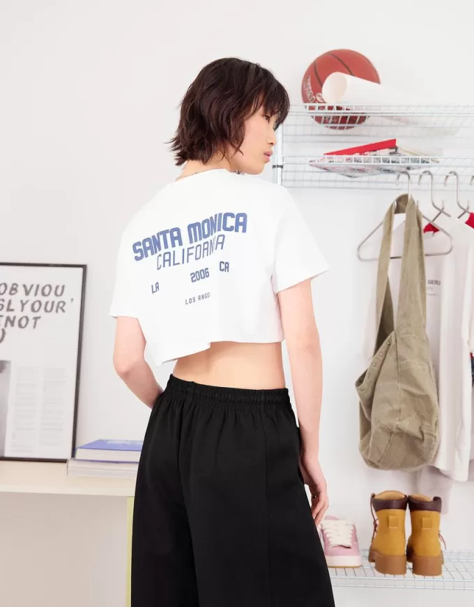 Pantaloni a botte in materiale felpato