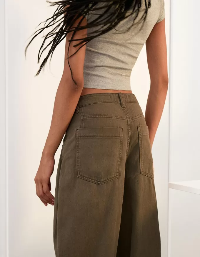 Pantaloni fluidi con pinces