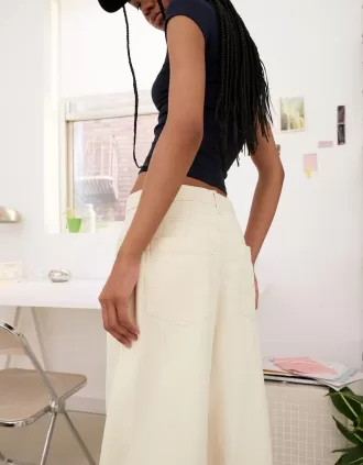 Pantaloni fluidi con pinces