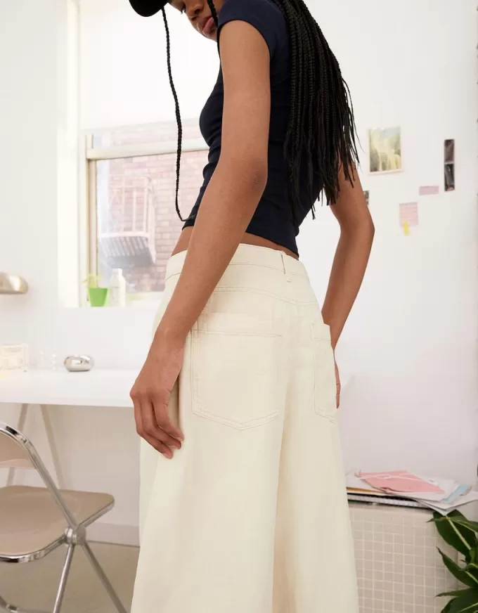 Pantaloni fluidi con pinces