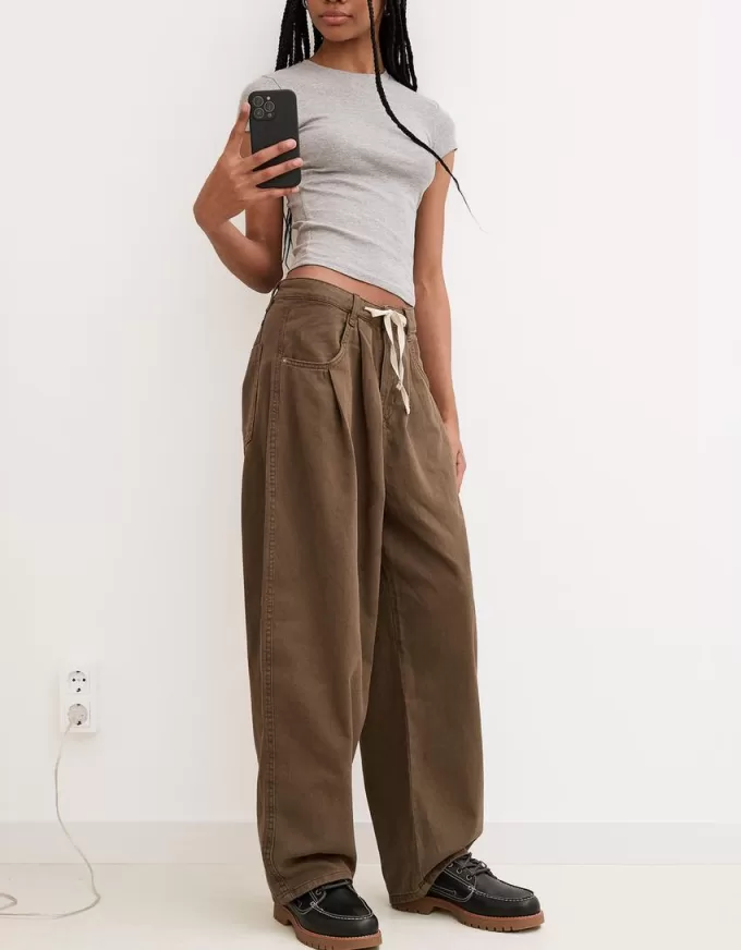 Pantaloni fluidi con pinces