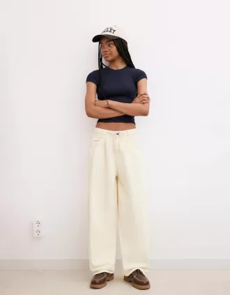 Pantaloni fluidi con pinces