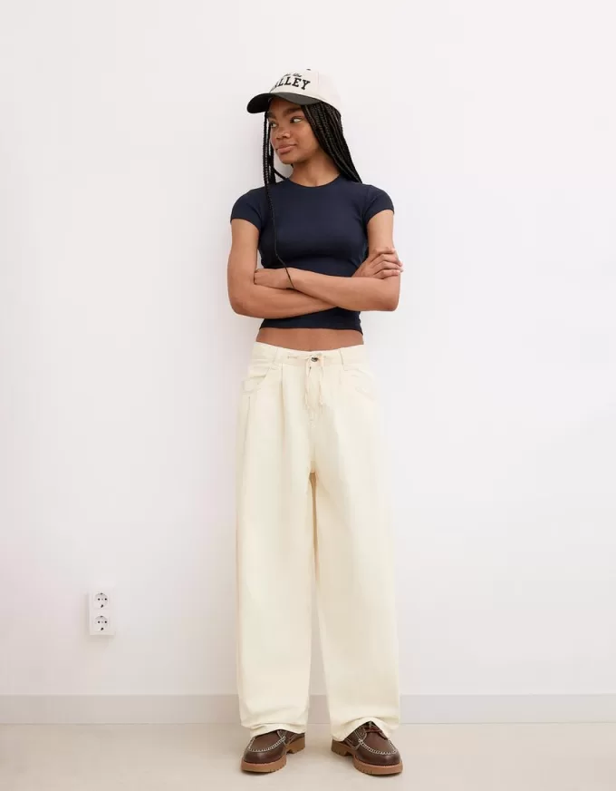 Pantaloni fluidi con pinces