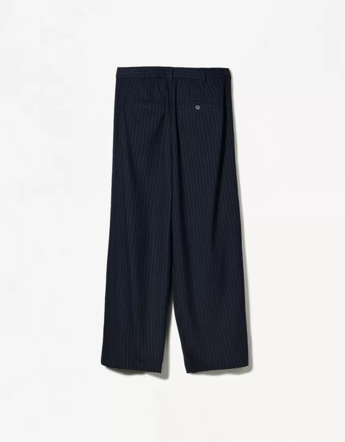 Pantaloni gessati su misura