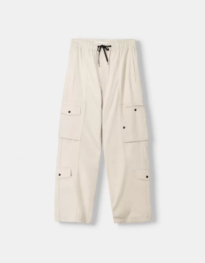 Pantaloni multicargo a gamba larga