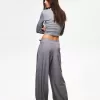 Pantaloni pinces con fibbia
