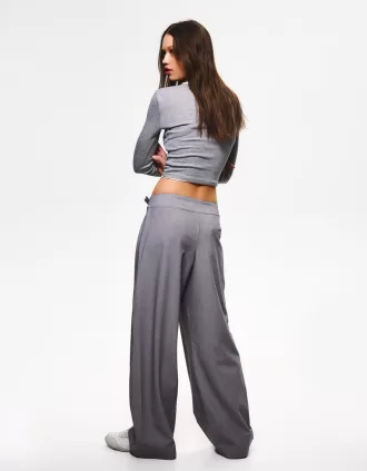 Pantaloni pinces con fibbia