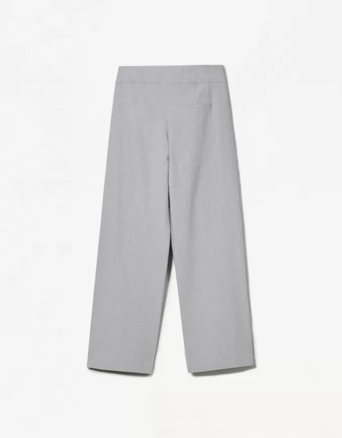 Pantaloni pinces con fibbia
