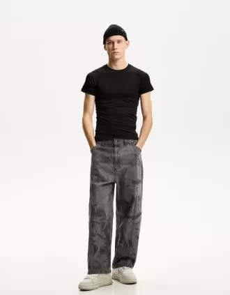 Pantaloni scoloriti super larghi