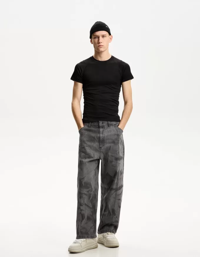 Pantaloni scoloriti super larghi