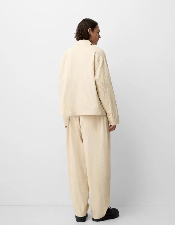 Pantaloni super larghi con piega