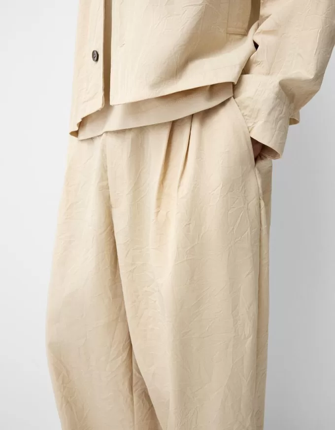 Pantaloni super larghi con piega