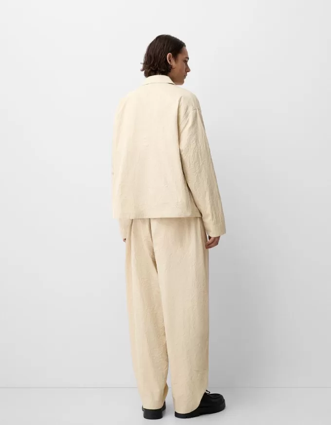 Pantaloni super larghi con piega